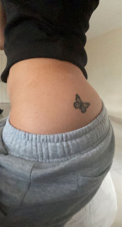 Butterfly buttcheek tattoo